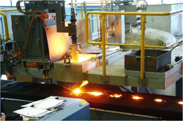 A machine at a foundry where EMSCO provided foundry services.